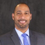 A headshot of Moises Feliz, the AVP of Lending/Office Manager at Zenith Crest Trust Bank .
